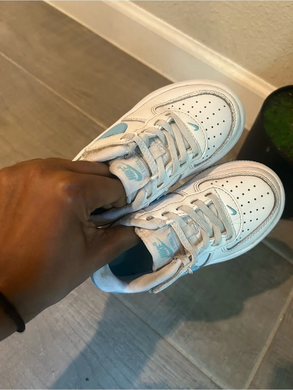 Nike Kids White Sneakers with Light Blue Accents